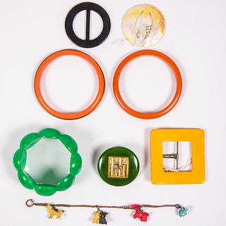 Seven Bakelite, Plastic and Shell Bracelets, Buckles and Brooch
