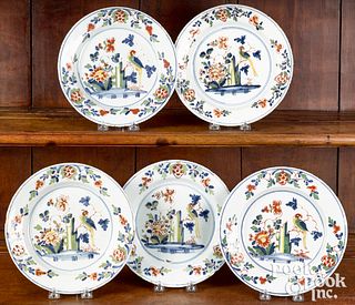 Five Delft polychrome parrot plates, mid 18th c.