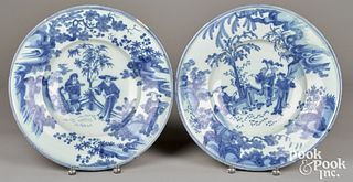 Two Dutch blue and white Delft chargers, 18th c.