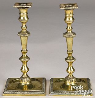 Pair of tall English brass candlesticks