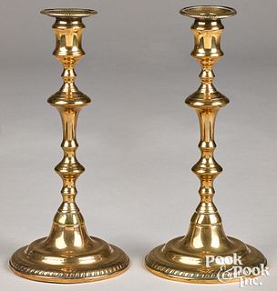 Pair of tall English bell metal candlesticks