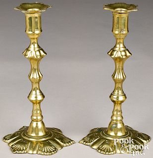 Pair of English brass shell base candlesticks