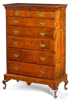 Queen Anne tiger maple chest on frame