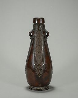 A banana leaf patterned copper vase