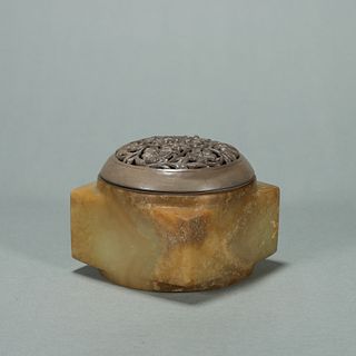 A jade cong with silver lid