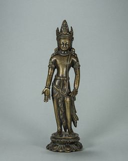 A copper Guanyin bodhisattva statue