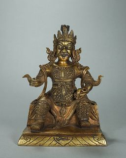 A gilding copper sitting yellow Jambhala statue