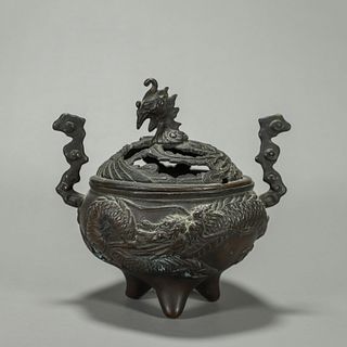 A dragon and phoenix patterned copper incense beurner with cloud shaped ears