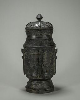 A taotie patterned copper pot 