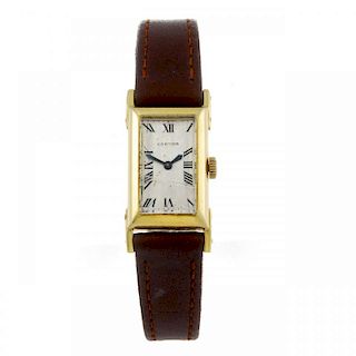 CARTIER - a wrist watch. Yellow metal case. Numbered 88206. Signed manual wind movement by Jaeger-Le