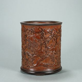 A chi dragon and grape carved bamboo brush pot