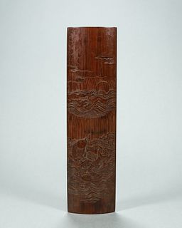 A fish carved bamboo arm rest