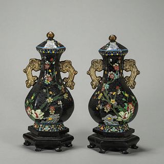 A pair of flower patterned cloisonne vases
