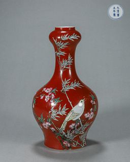 A red glazed famille rose bird and flower porcelain vase