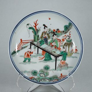 A multicolored figure porcelain plate