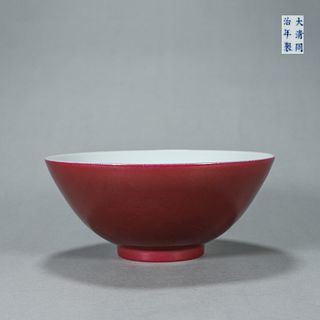 A red glazed porcelain bowl
