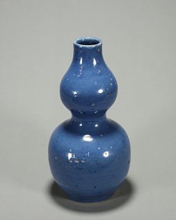 A blue glazed porcelain gourd-shaped vase