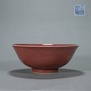 A red glazed porcelain bowl