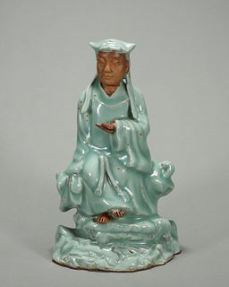 A Longquan kiln porcelain figure statue