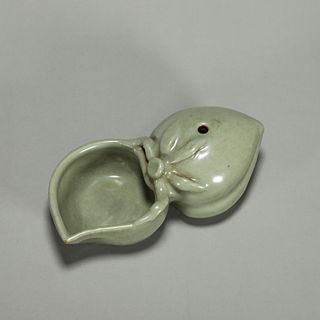 A Longquan kiln celadon glazed porcelain peach shaped water pot