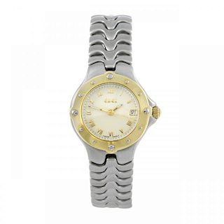 EBEL - a lady's Sportswave bracelet watch. Stainless steel case with yellow metal bezel. Reference E