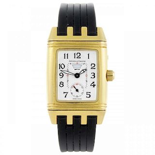 JAEGER-LECOULTRE - a lady's Reverso wrist watch. 18ct yellow gold case, factory diamond set case to