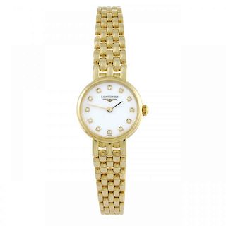 LONGINES - a lady's Prestige bracelet watch. 18ct yellow gold case. Reference L6.107.6, serial rubbe