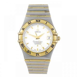 OMEGA - a gentleman's Constellation bracelet watch. Stainless steel case with yellow metal chapter r