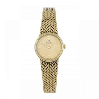 OMEGA - a lady's bracelet watch. 9ct yellow gold case. Numbered 101E. Signed quartz calibre 1455, nu