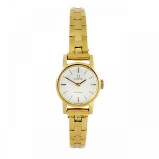 OMEGA - a lady's bracelet watch. Yellow metal case with stainless steel case back. Numbered 511.314.