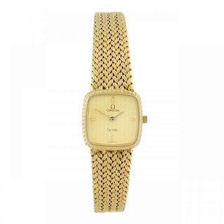 OMEGA - a lady's De Ville bracelet watch. Gold plated case with stainless steel case back. Numbered