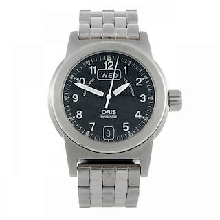 ORIS - a gentleman's BC3 bracelet watch. Stainless steel case with exhibition case back. Reference 7