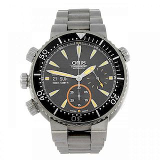 ORIS - a limited edition gentleman's Carlos Coste chronograph bracelet watch. Number 912 of 2000. Ti