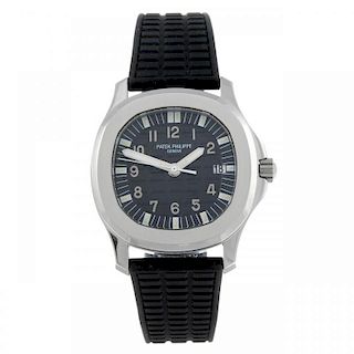 PATEK PHILIPPE - a gentleman's Aquanaut wrist watch. Stainless steel case. Reference 5064, serial 42