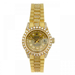 ROLEX - a lady's Oyster Perpetual Datejust bracelet watch. Circa 1977. Diamond set 18ct yellow gold