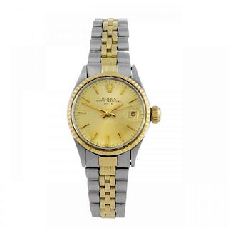 ROLEX - a lady's Oyster Perpetual Date bracelet watch. Circa 1968. Stainless steel case with yellow