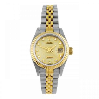 ROLEX - a lady's Oyster Perpetual Datejust bracelet watch. Circa 1991. Stainless steel case with yel