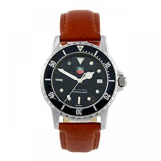 TAG HEUER - a gentleman's 1500 Series wrist watch. Stainless steel case with calibrated bezel. Refer