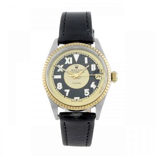 TUDOR - a mid-size wrist watch. Stainless steel case with yellow metal fluted bezel. Signed automati