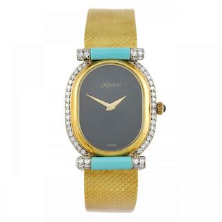 DELANEAU - a lady's bracelet watch. 18ct yellow gold case with factory diamond set bezel, import hal