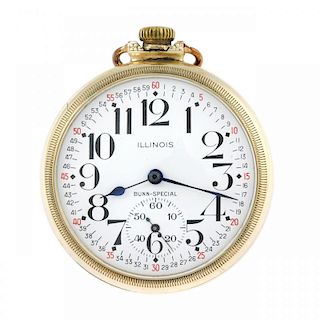 An open face railway grade pocket watch by Illinois Watch Co. Gold plated case, numbered 7885980. Si