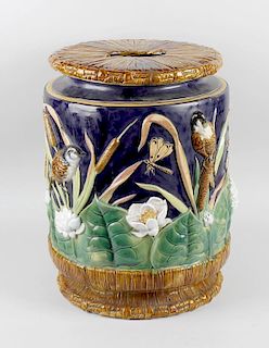 A George Jones type majolica pottery garden seat, of barrel shape, the top with pierced aperture for