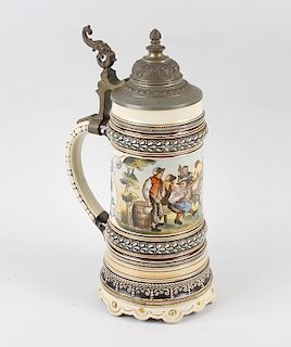 A German porcelain stein, decorated with drinking scene between raised foliate borders and lobed bas