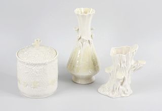 A collection of Belleek china wares. Each having pale yellow glaze decoration upon a cream ground, t
