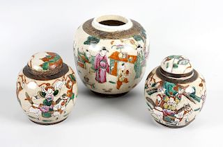 A box containing a mixed selection of nine assorted oriental pottery and porcelain ginger jars, some