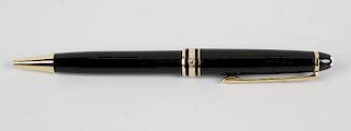 A Montblanc Meisterstuck roller ball pen, the floating Montblanc star in black domed end cap, the bo
