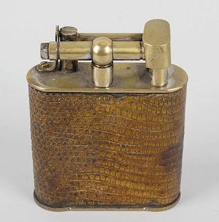 A large Wilson & Gill table lighter. Pat. 286838, with brass fittings and snakeskin-covered body, 4.