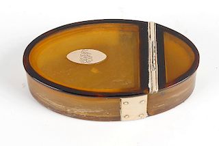 A George III yellow metal mounted oval snuff box, the hinged opening cover inset with an oval panel