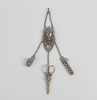 A 19th century Grecian revival chatelaine, the belt clip formed as the head of a classical female, s