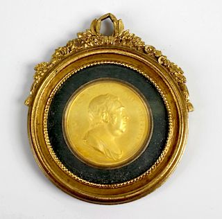 A 19th century embossed gilt metal circular portrait panel, bust side profile, depicting Charles Jam